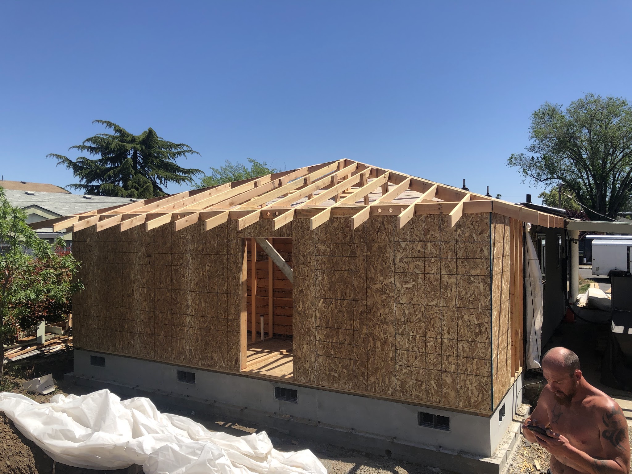New structure framed and sheathed, ready for roofing